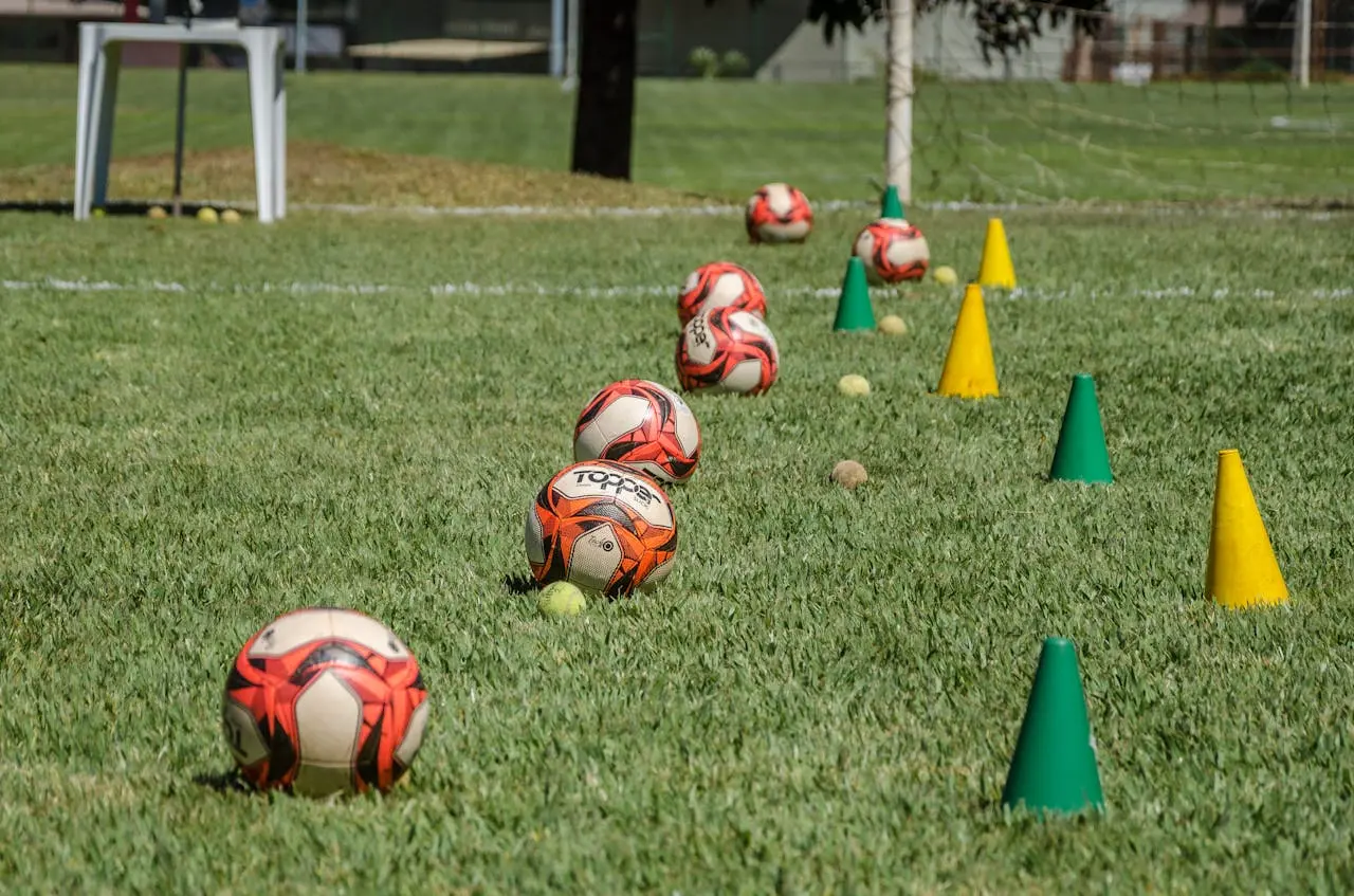 Youth soccer training setup with cones and ball on turf field at South Van FC academy in Vancouver
